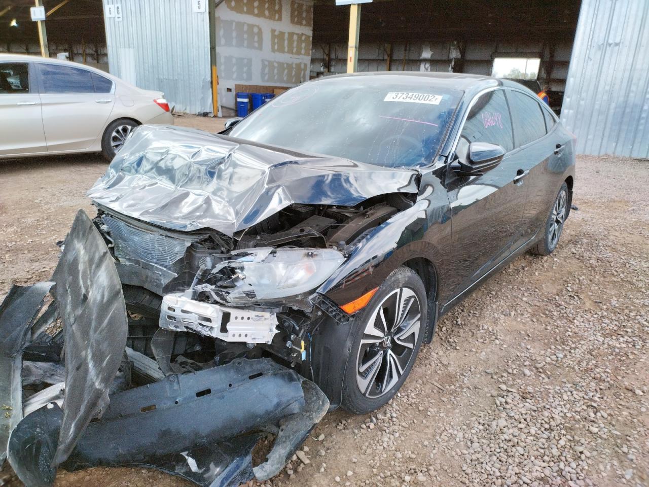 Photo 2 from auction – 2016 HONDA CIVIC EX with VIN 19XFC1F36GE032283