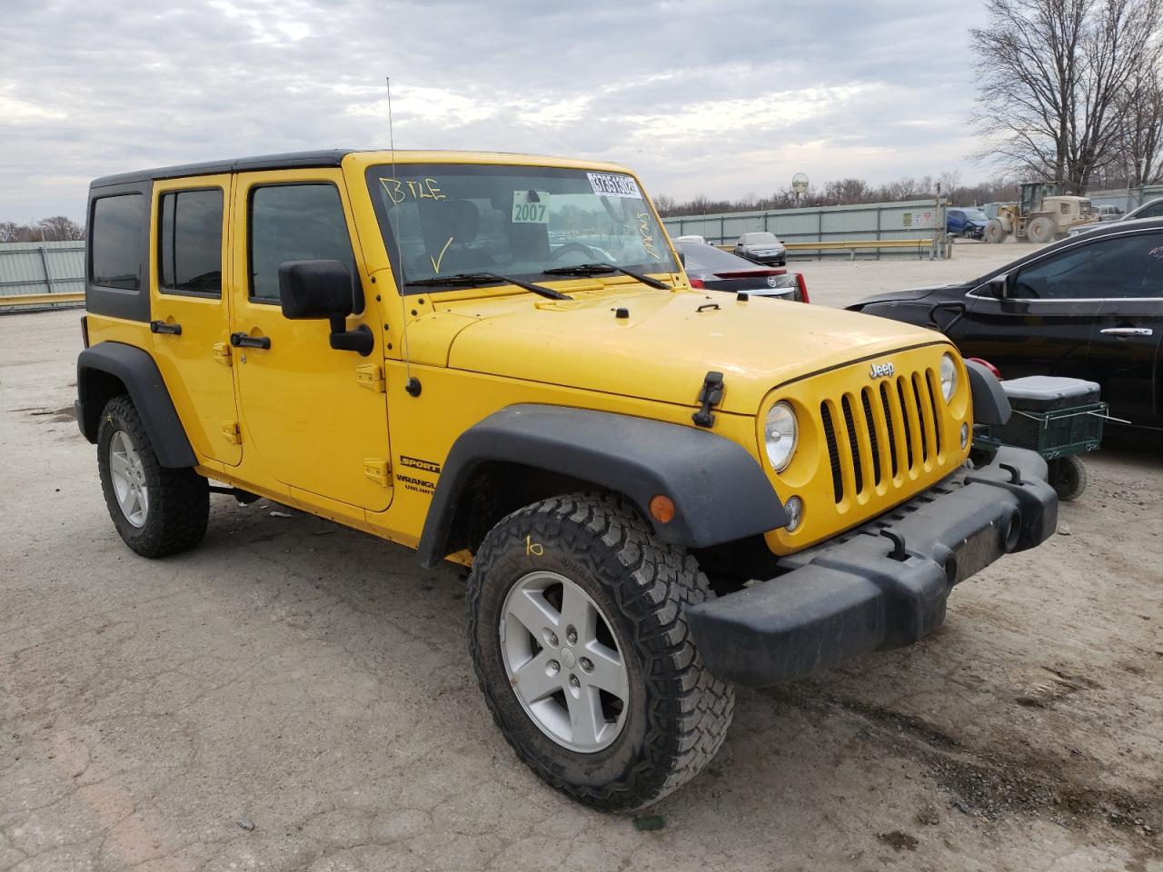JEEP WRANGLER U 2015 with VIN 1C4BJWDG5FL698712 - Photo from auction