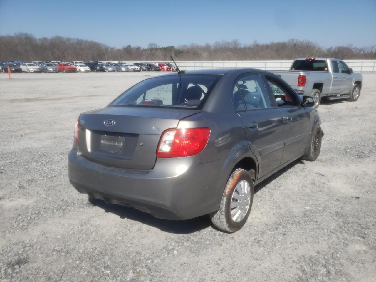 Photo 4 from auction – 2010 KIA RIO LX with VIN KNADH4A36A6664521