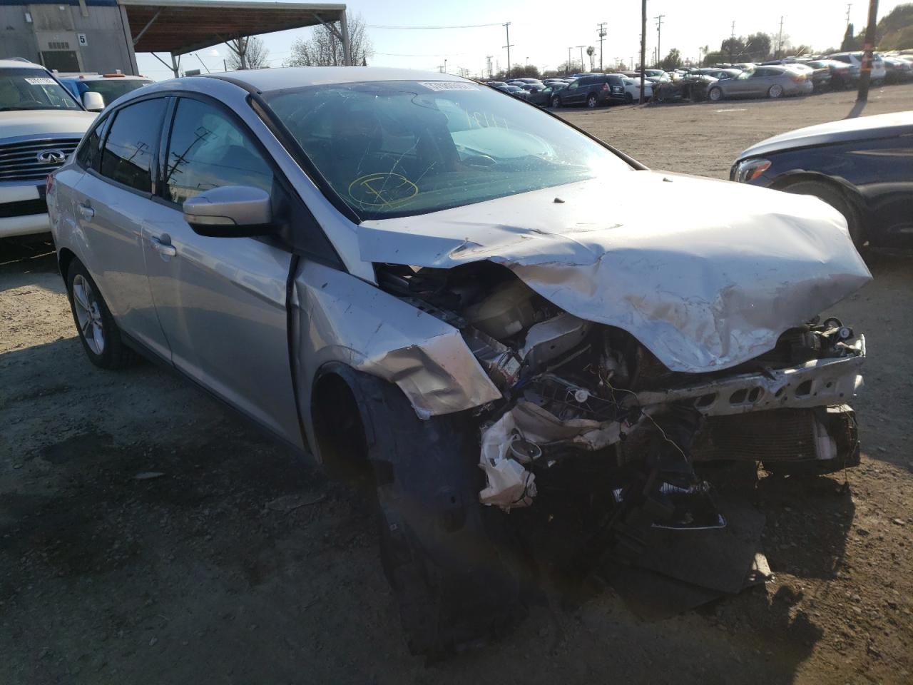 FORD FOCUS SE 2014 with VIN 1FADP3F26EL108934 - Photo from auction