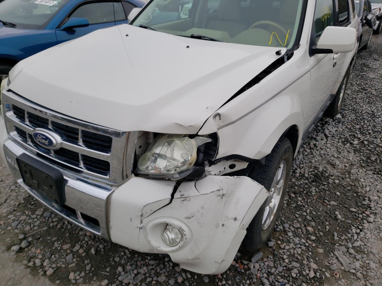 Photo 9 from auction – 2011 FORD ESCAPE LIM with VIN 1FMCU0E72BKA47444