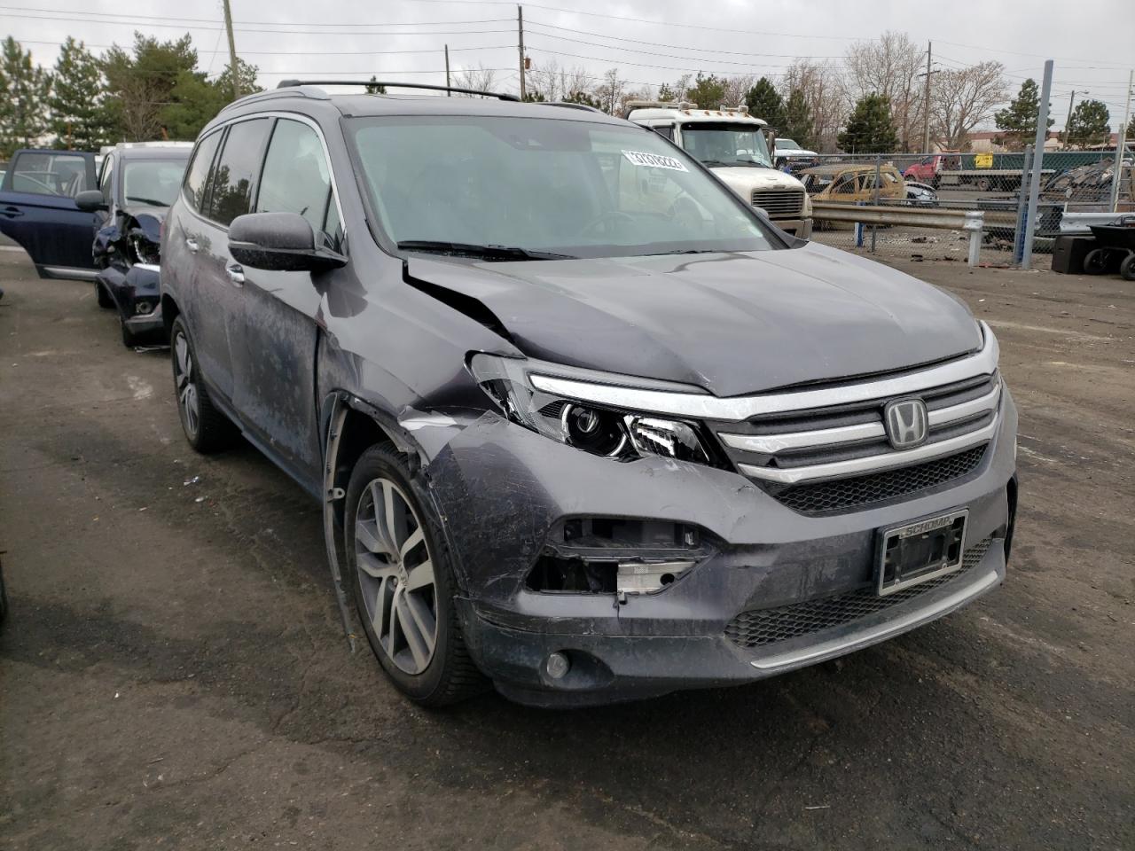 HONDA PILOT ELIT 2017 with VIN 5FNYF6H08HB046410 - Photo from auction