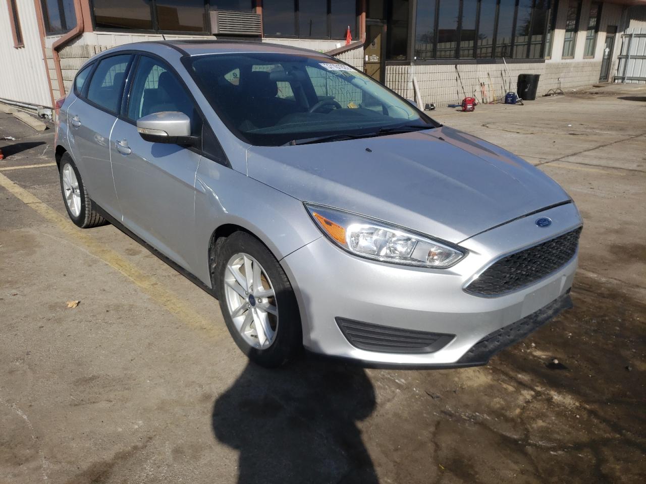 FORD FOCUS SE 2016 with VIN 1FADP3K25GL283782 - Photo from auction