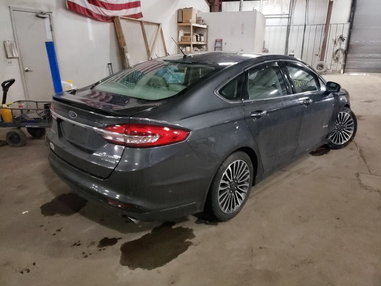 Photo 4 from auction – 2018 FORD FUSION TIT with VIN 3FA6P0RU0JR114602