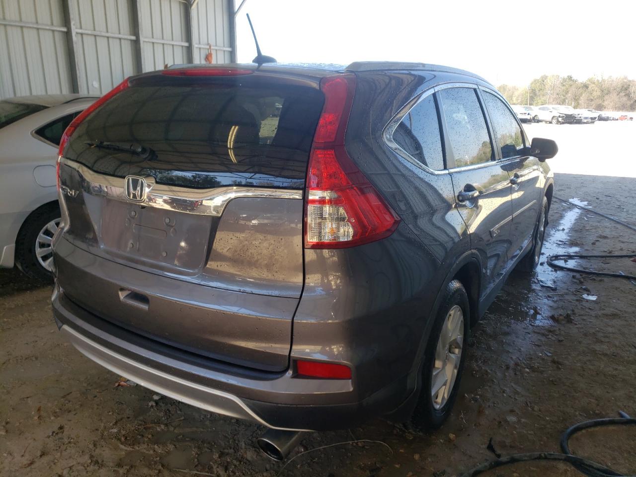 Photo 4 from auction – 2016 HONDA CR-V EXL with VIN 2HKRM3H7XGH520136