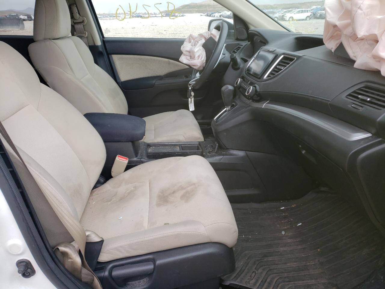 Photo 5 from auction – 2015 HONDA CR-V EX with VIN 5J6RM4H54FL115012