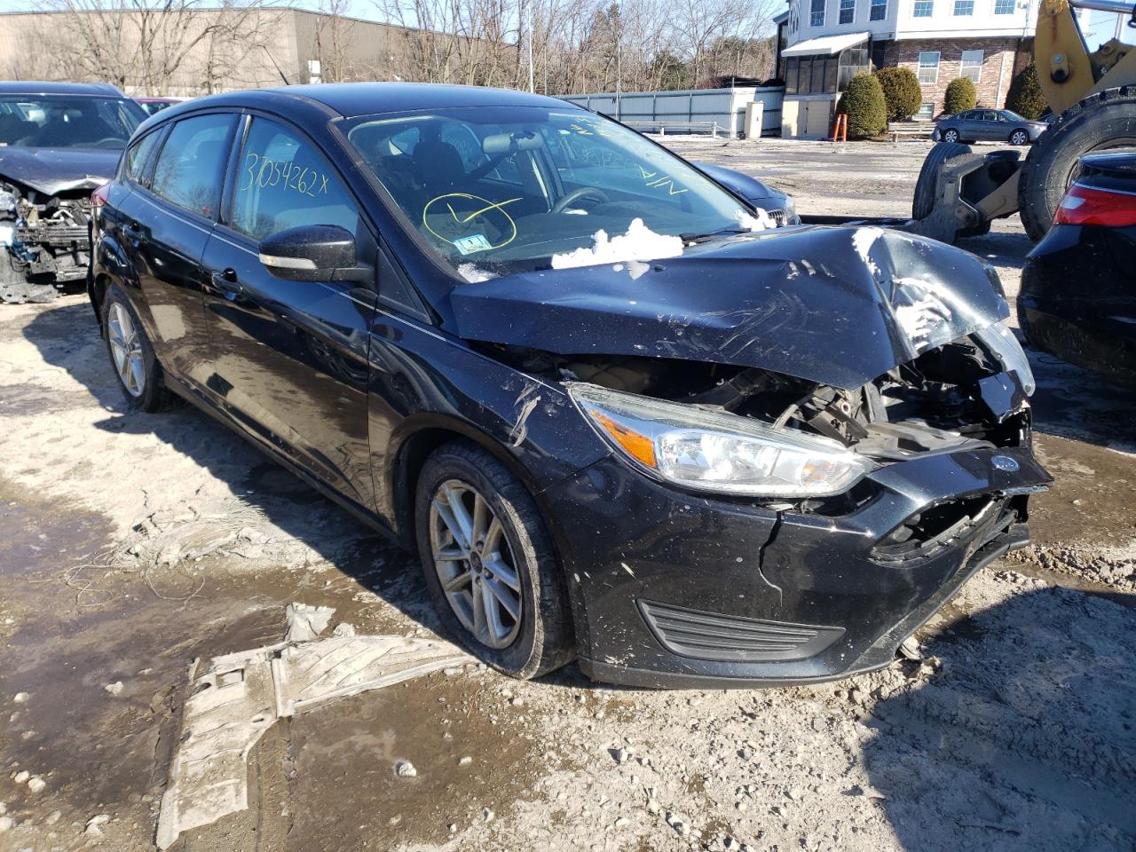 FORD FOCUS SE 2015 with VIN 1FADP3K20FL301118 - Photo from auction