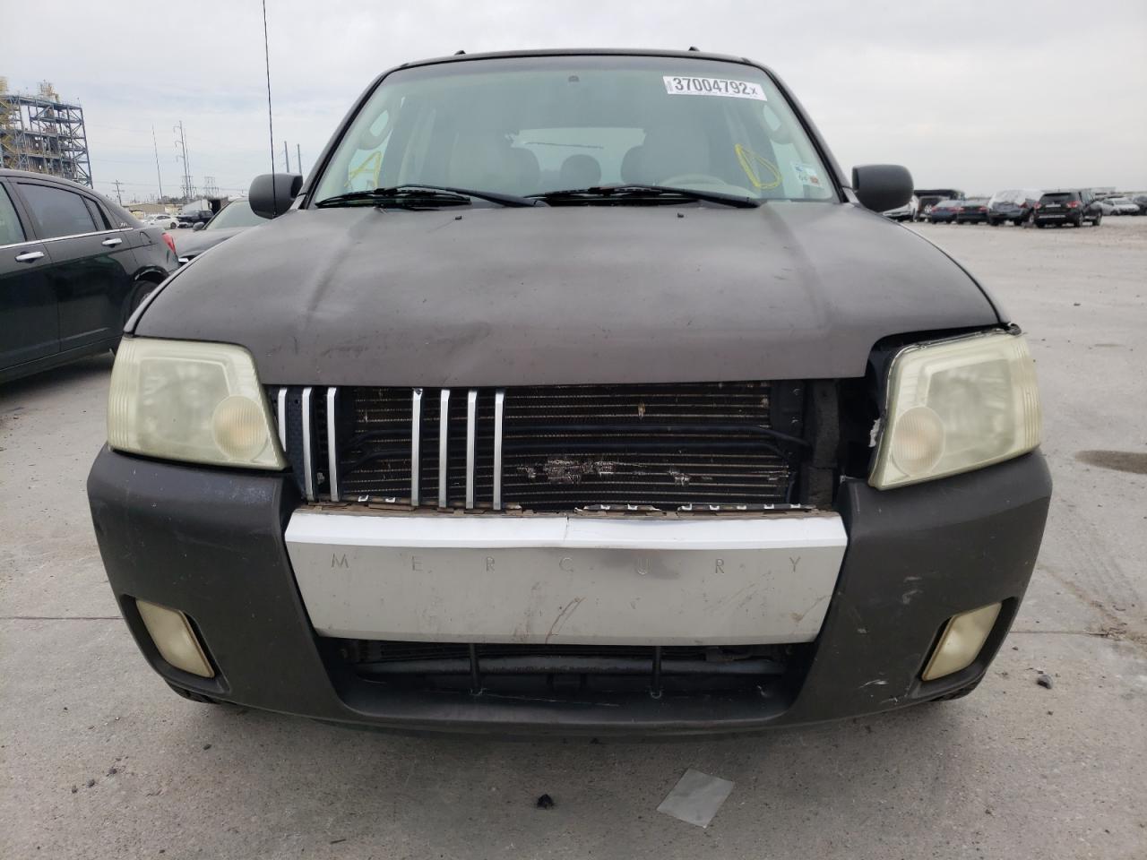 Photo 9 from auction – 2006 MERCURY MARINER with VIN 4M2YU56136KJ14943
