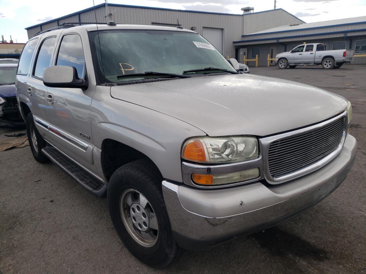 GMC YUKON 2004 with VIN 1GKEC13T34R262397 - Photo from auction