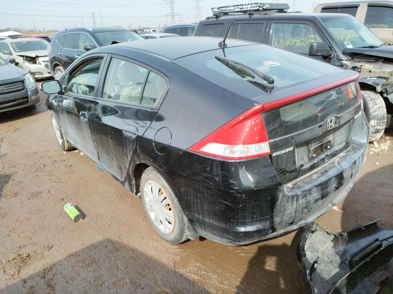 Photo 3 from auction – 2010 HONDA INSIGHT LX with VIN JHMZE2H53AS002284