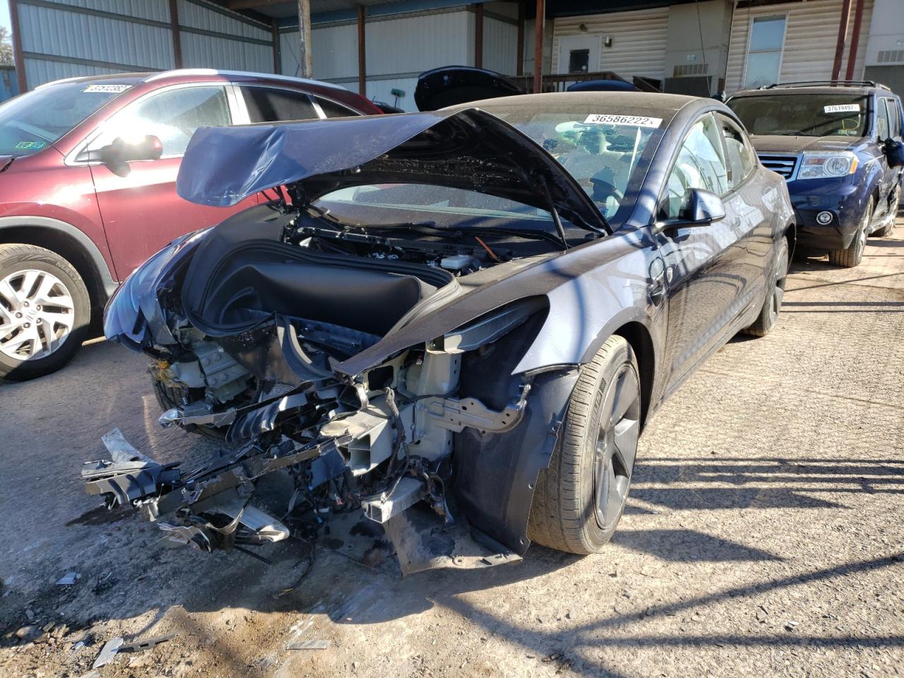 Photo 2 from auction – 2021 TESLA MODEL 3 with VIN 5YJ3E1EBXMF903083