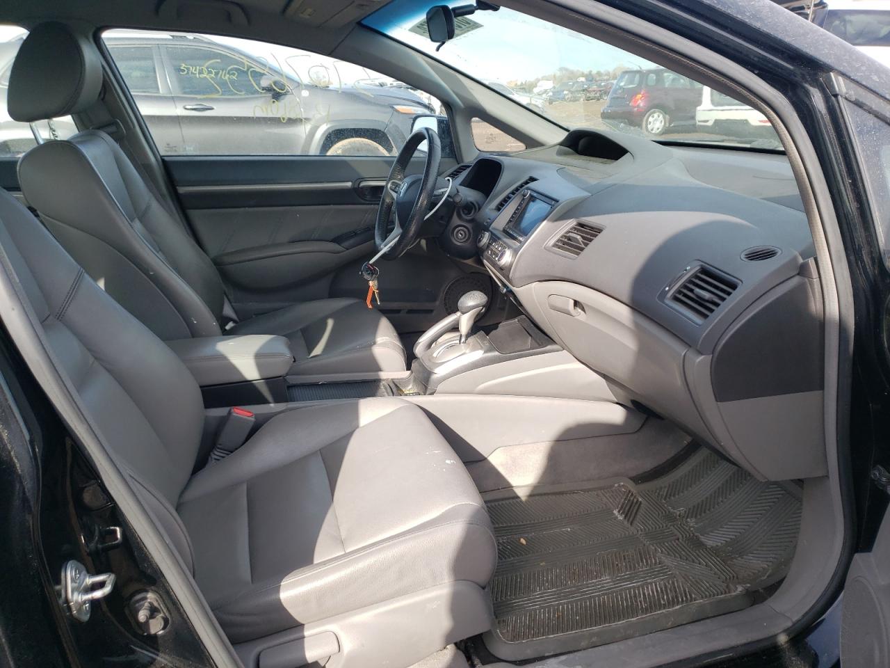 Photo 5 from auction – 2010 HONDA CIVIC EXL with VIN 19XFA1F94AE019713