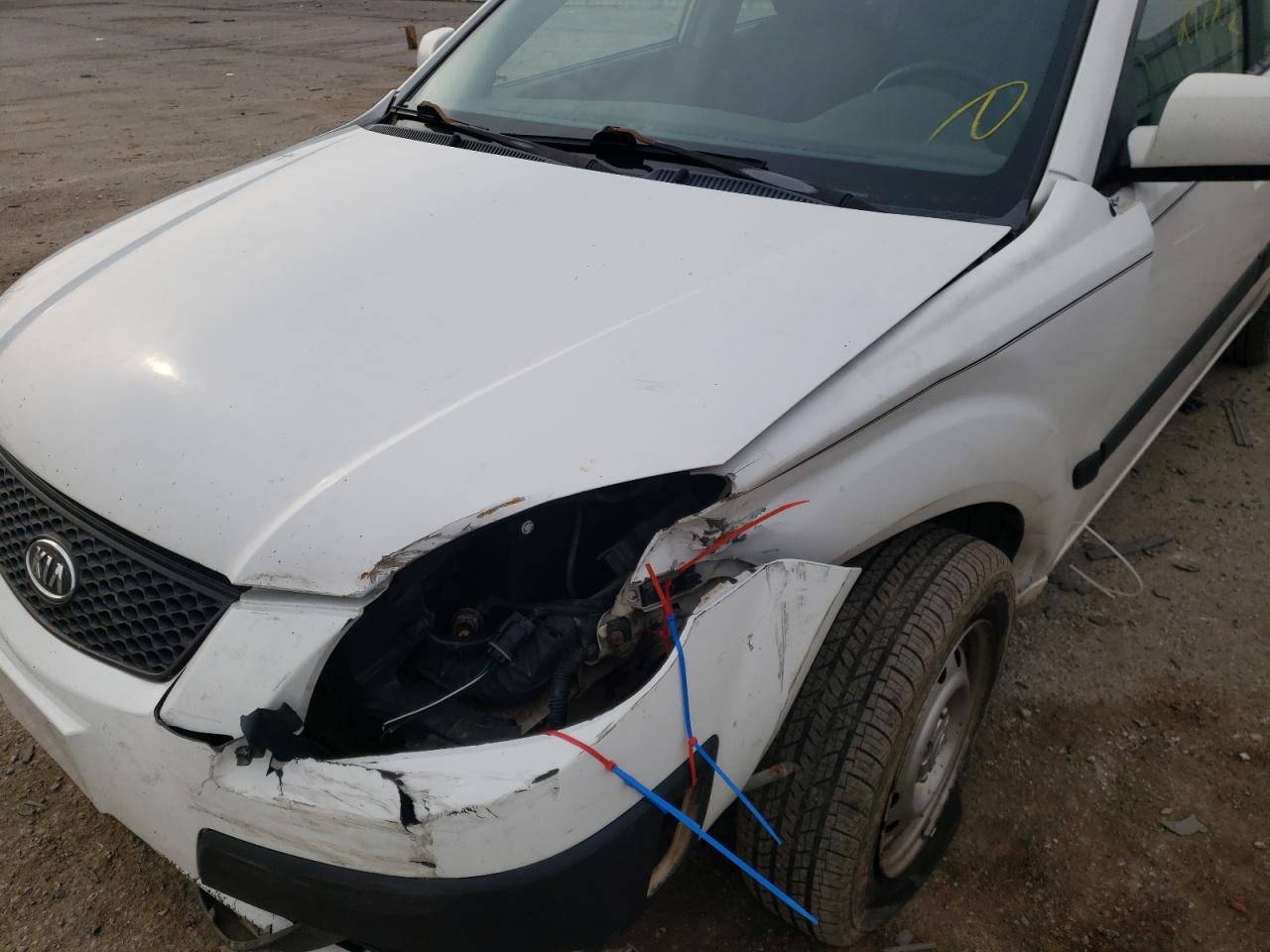 Photo 9 from auction – 2009 KIA RIO BASE with VIN KNADE223296466381