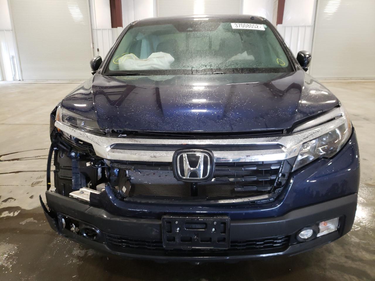 Photo 9 from auction – 2020 HONDA RIDGELINE with VIN 5FPYK3F51LB016108