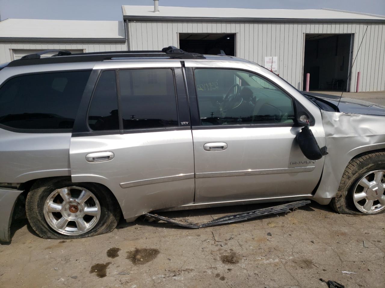 Photo 9 from auction – 2006 GMC ENVOY with VIN 1GKDT13S662214133