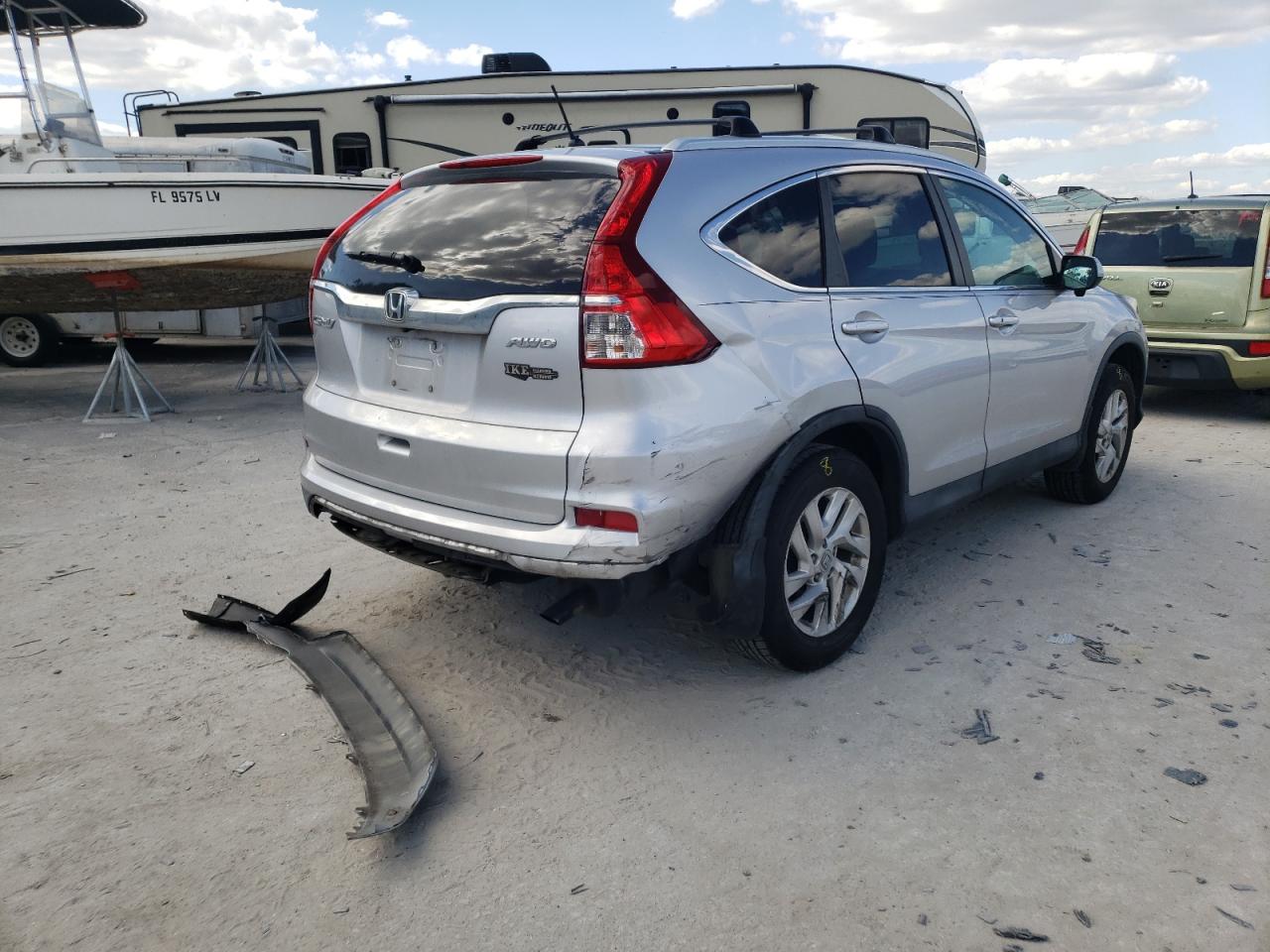 Photo 4 from auction – 2016 HONDA CR-V EX with VIN 2HKRM4H54GH720739