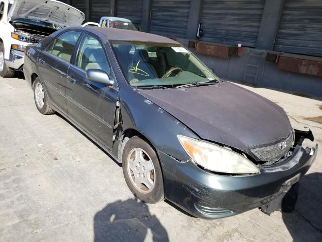 TOYOTA CAMRY LE 2002 with VIN 4T1BF30K02U518515 - Photo from auction