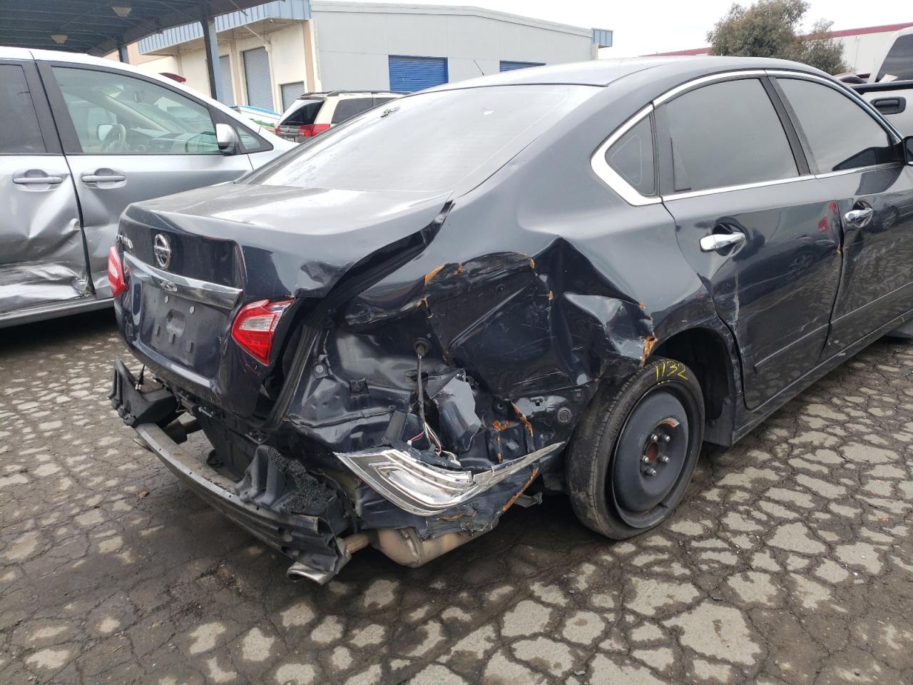 Photo 9 from auction – 2016 NISSAN ALTIMA 2.5 with VIN 1N4AL3AP7GN344940