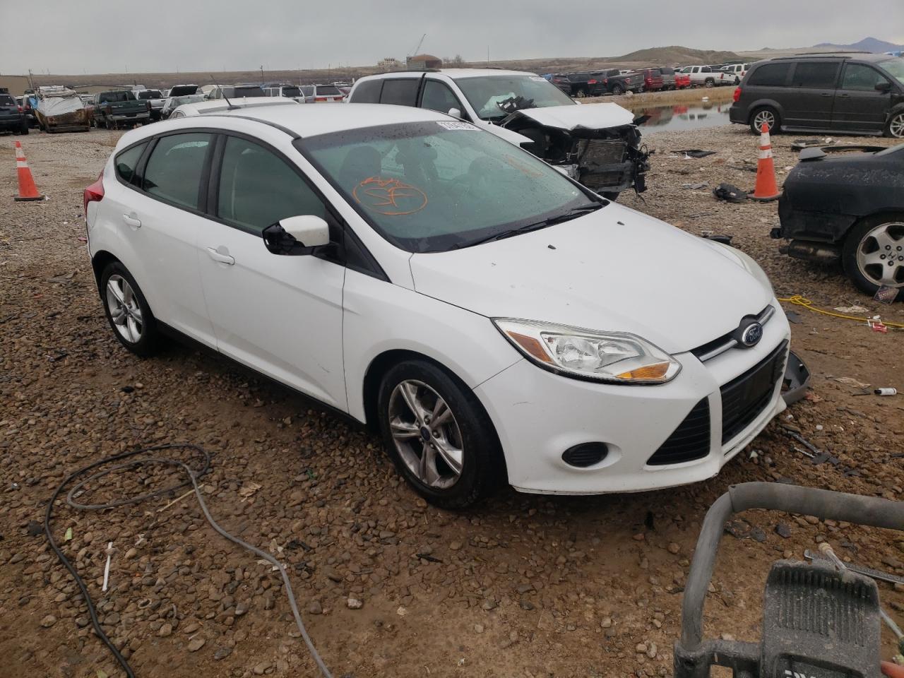 FORD FOCUS SE 2014 with VIN 1FADP3K27EL325060 - Photo from auction