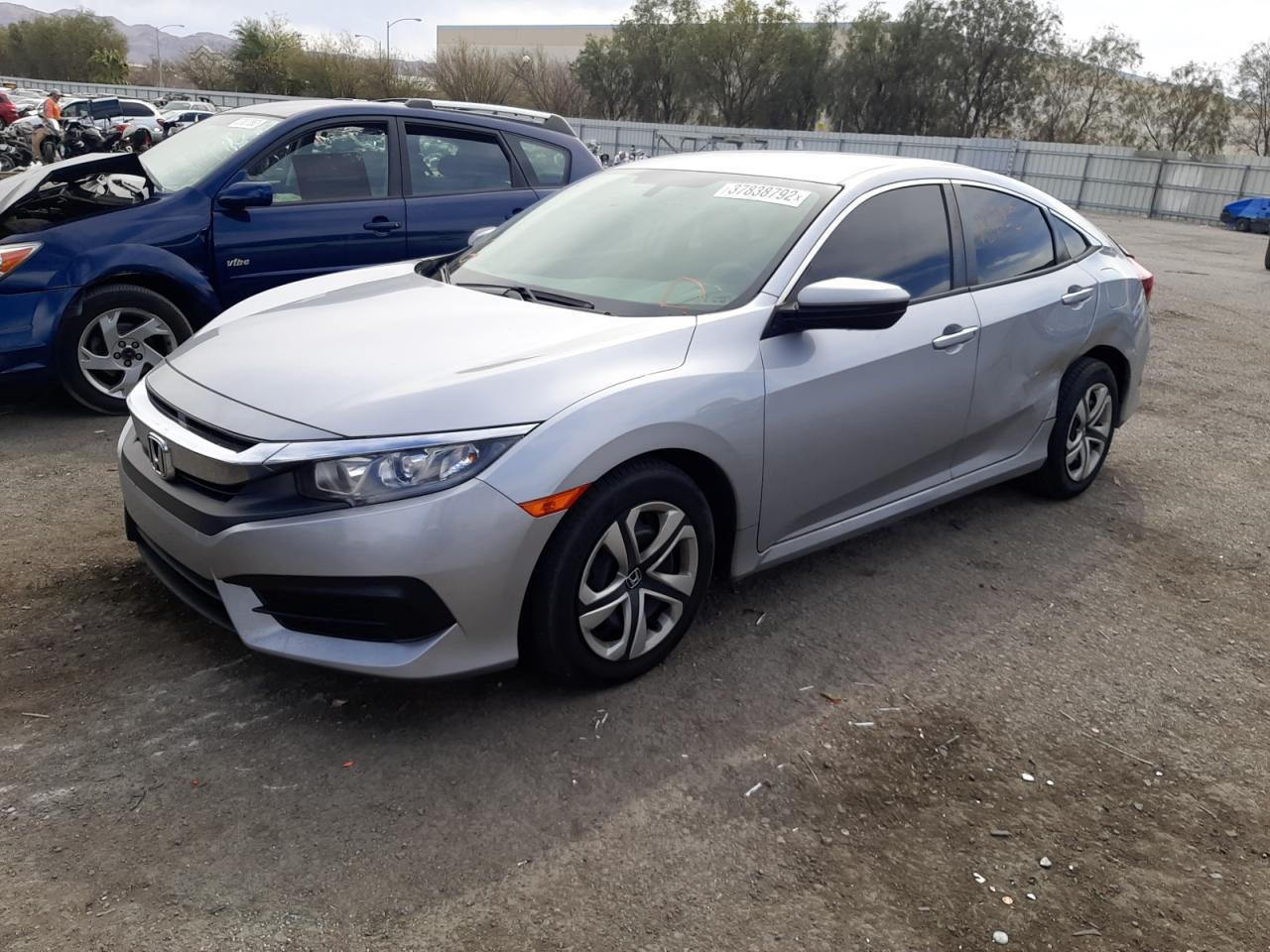 Photo 2 from auction – 2017 HONDA CIVIC LX with VIN 2HGFC2F53HH561043