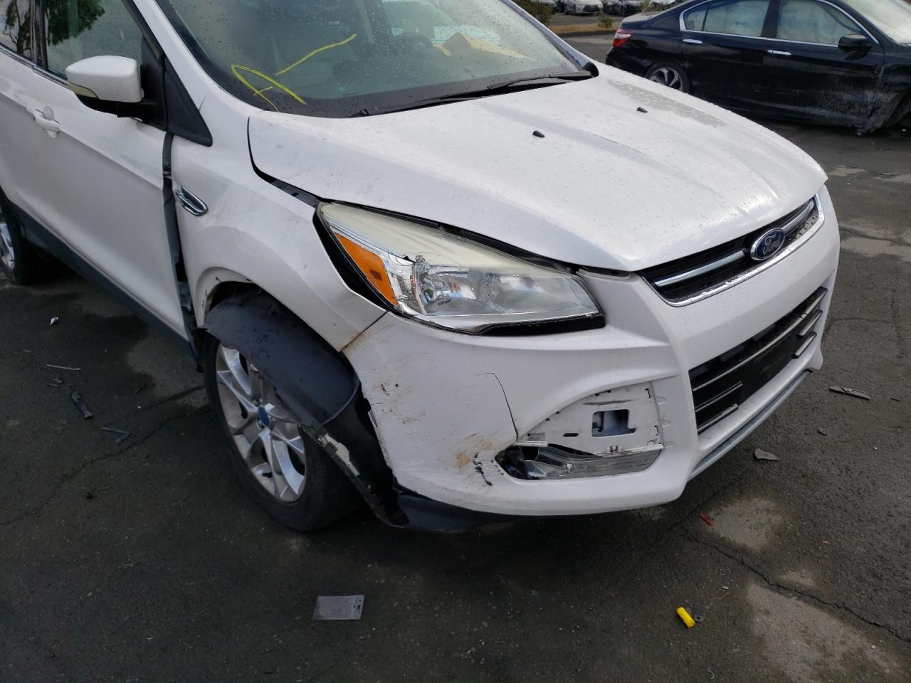 Photo 9 from auction – 2013 FORD ESCAPE SEL with VIN 1FMCU0HX1DUC34046
