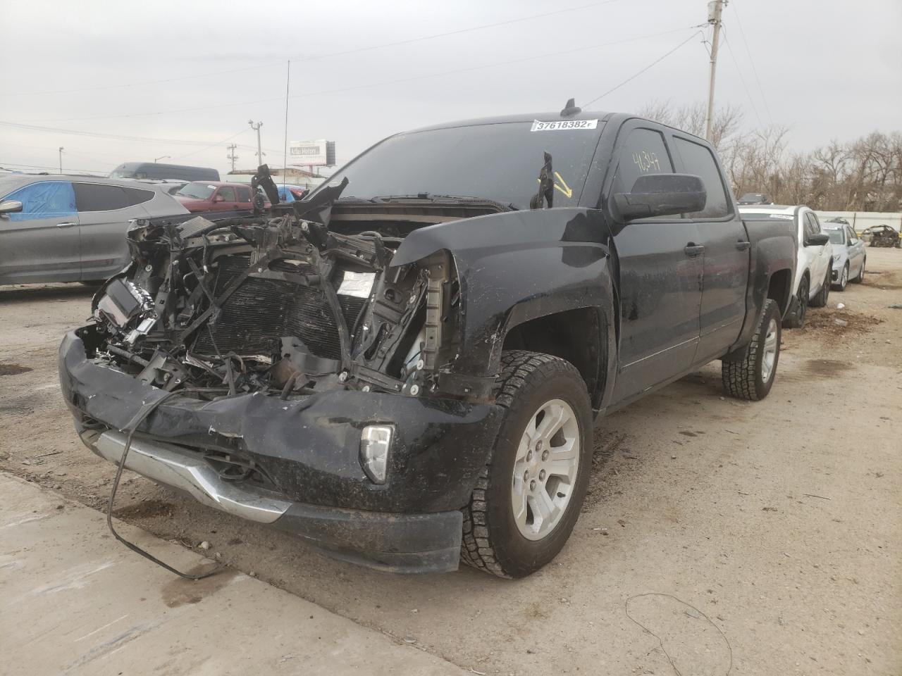 Photo 2 from auction – 2018 CHEVROLET SILVERADO with VIN 3GCUKREC7JG511513