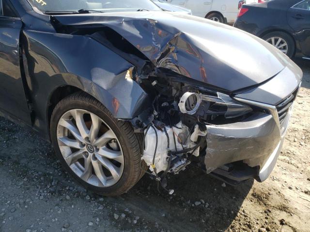 Photo 9 from auction – 2014 MAZDA 3 TOURING with VIN JM1BM1L33E1203331