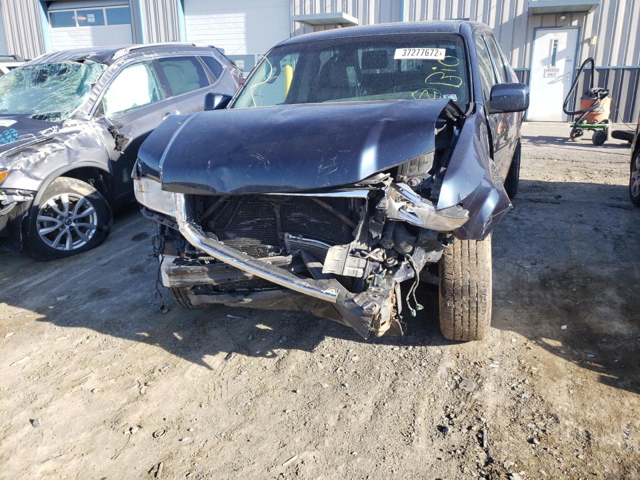 Photo 9 from auction – 2010 HONDA RIDGELINE with VIN 5FPYK1F56AB003260