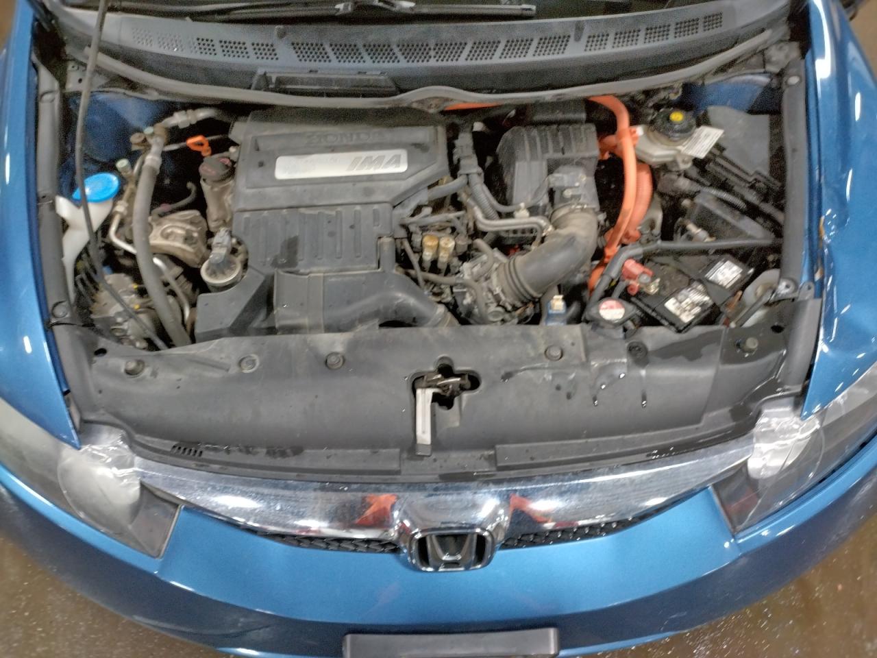 Photo 7 from auction – 2010 HONDA CIVIC HYBR with VIN JHMFA3F25AS006284