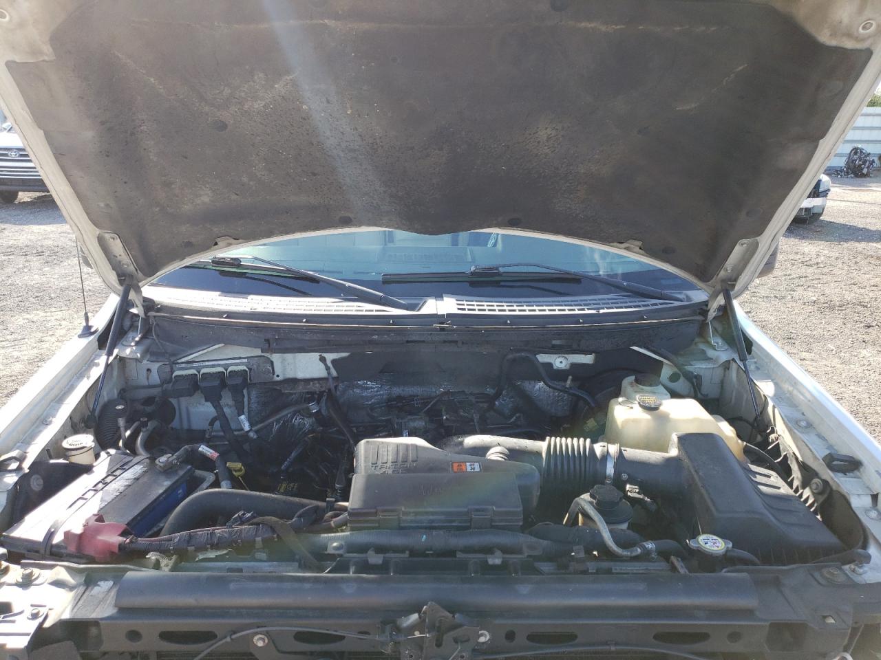 Photo 7 from auction – 2010 FORD F150 with VIN 1FTMF1CW3AKB32469