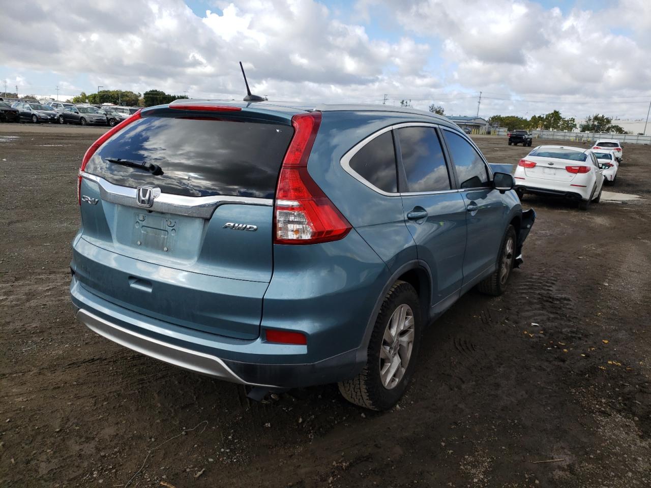 Photo 4 from auction – 2015 HONDA CR-V EXL with VIN 2HKRM4H79FH601102