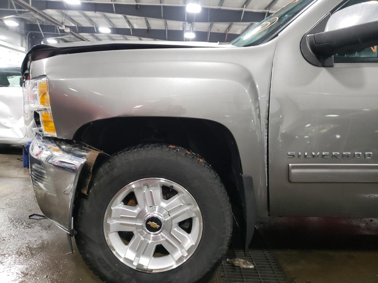 Photo 9 from auction – 2013 CHEVROLET SILVERADO with VIN 1GCRKSE71DZ342500