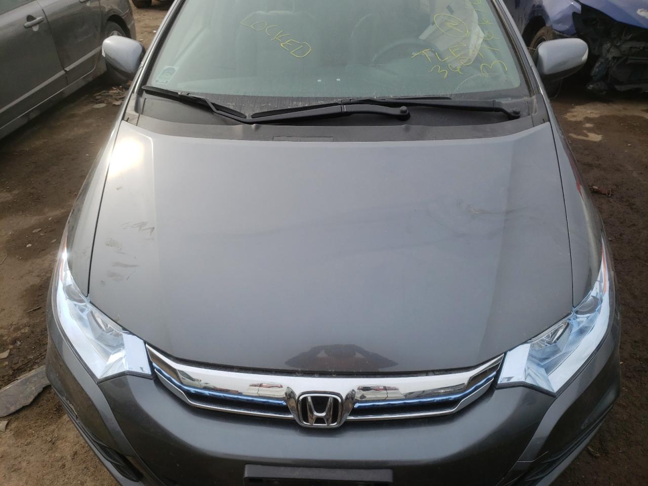Photo 7 from auction – 2012 HONDA INSIGHT EX with VIN JHMZE2H7XCS004473
