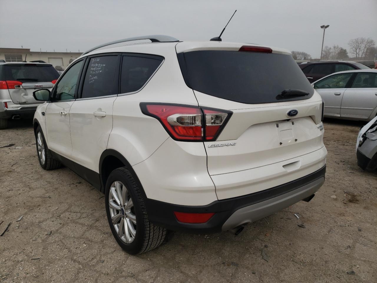 Photo 3 from auction – 2017 FORD ESCAPE TIT with VIN 1FMCU0JD1HUB14026
