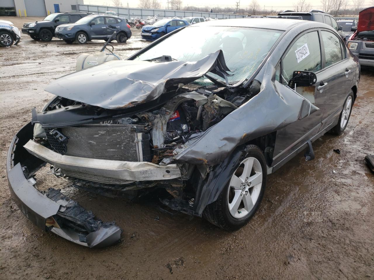 Photo 2 from auction – 2010 HONDA CIVIC LX-S with VIN 19XFA1F65AE017734