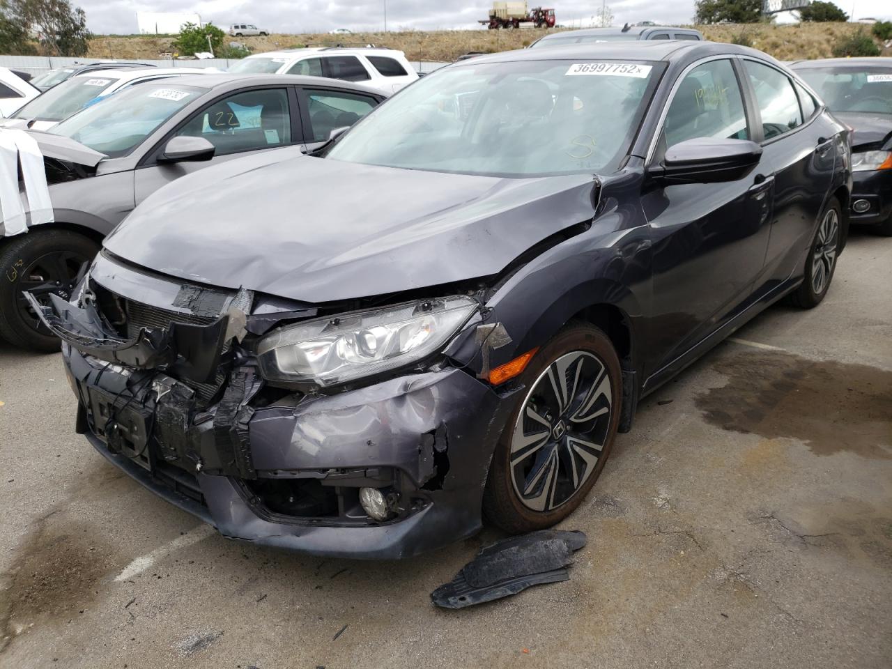 Photo 2 from auction – 2016 HONDA CIVIC EXL with VIN 2HGFC1F77GH650236