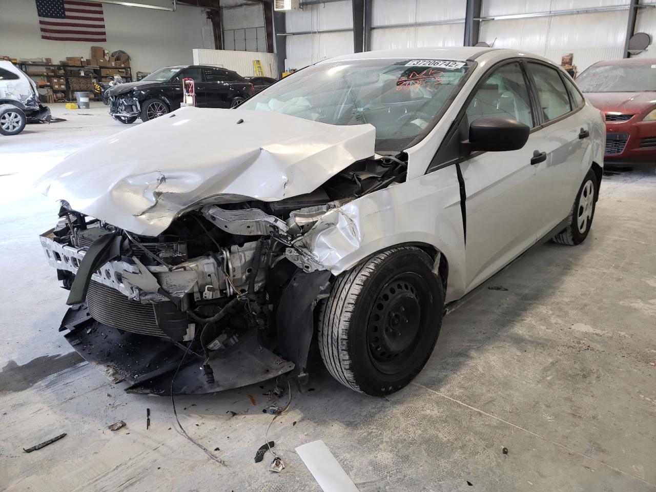 Photo 2 from auction – 2013 FORD FOCUS S with VIN 1FADP3E25DL182023