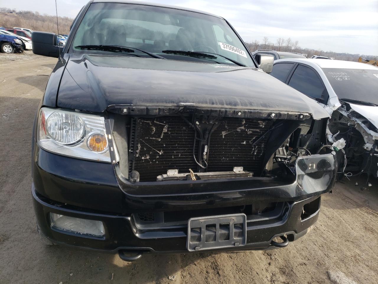 Photo 9 from auction – 2004 FORD F150 with VIN 1FTPX14554FA00620