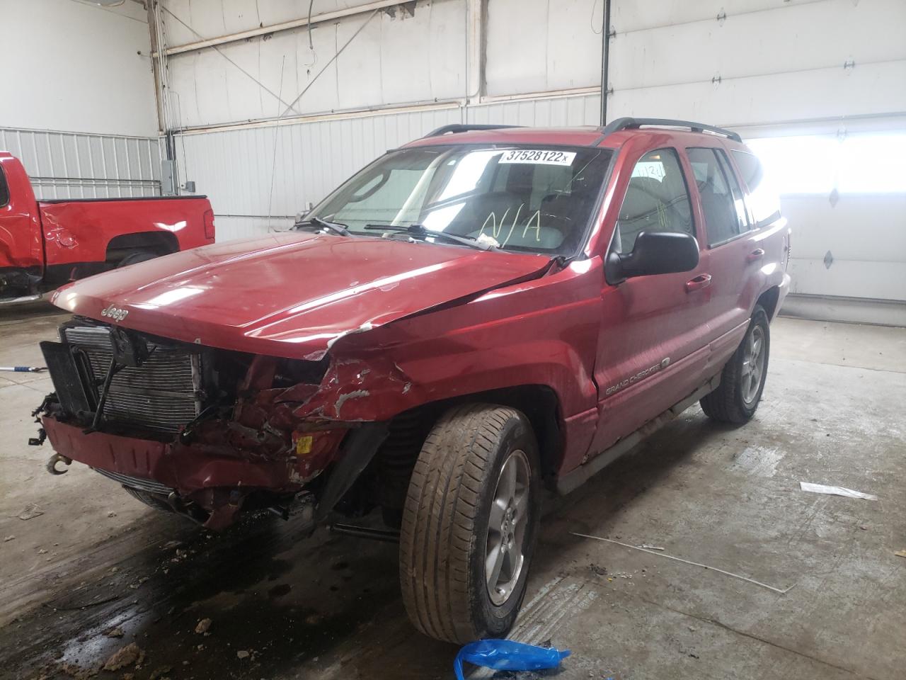 Photo 2 from auction – 2002 JEEP GRAND CHER with VIN 1J8GW68JX2C215683