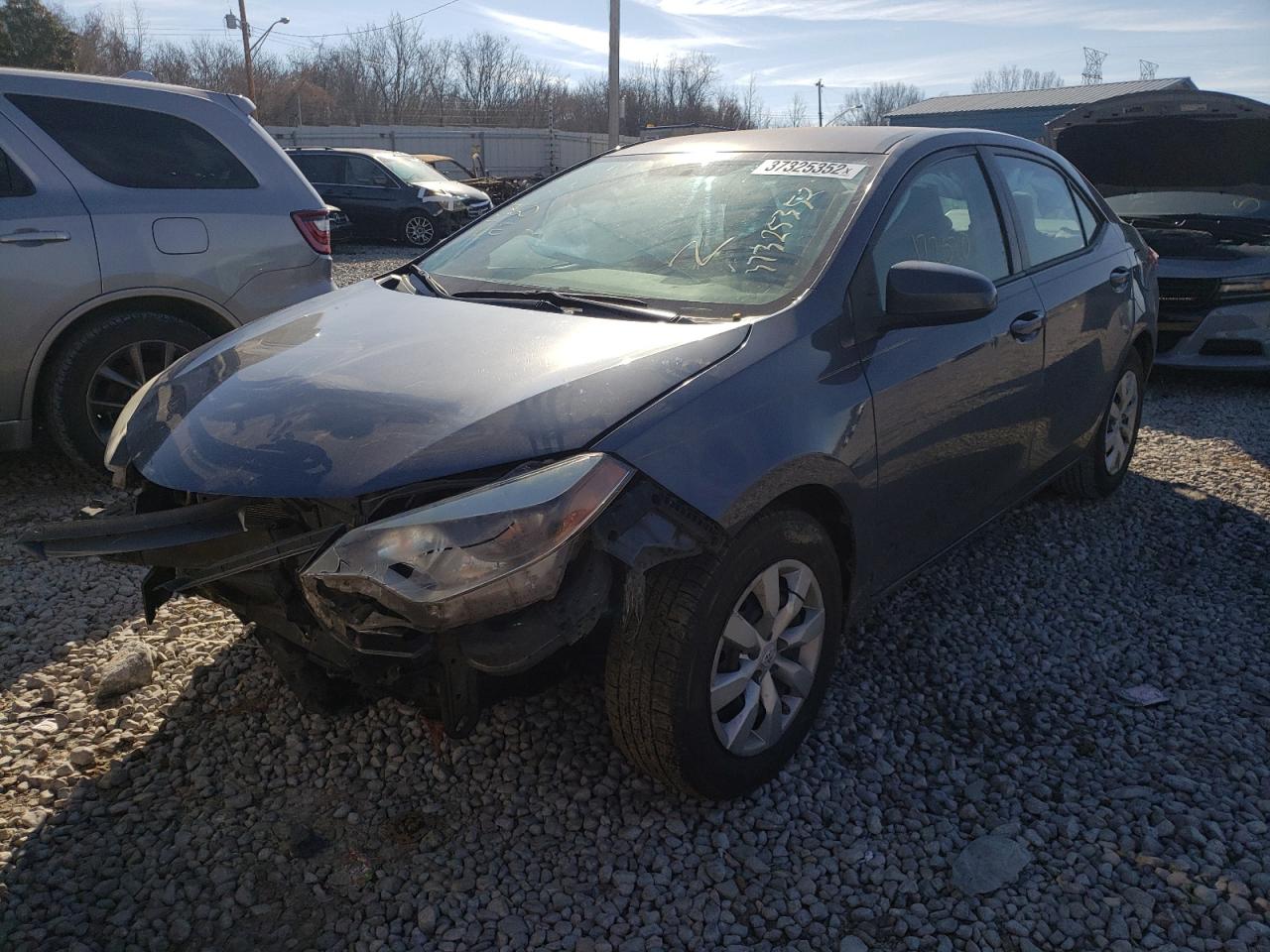 Photo 2 from auction – 2016 TOYOTA COROLLA L with VIN 5YFBURHE5GP470011