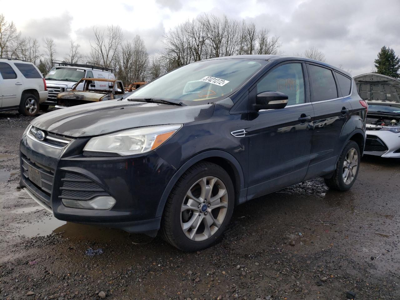 Photo 2 from auction – 2013 FORD ESCAPE SEL with VIN 1FMCU9H91DUA09969