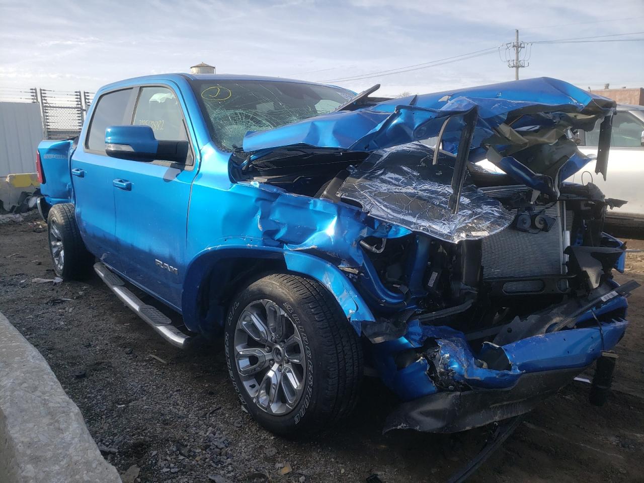 RAM 1500 LARAM 2021 with VIN 1C6SRFJTXMN774024 - Photo from auction