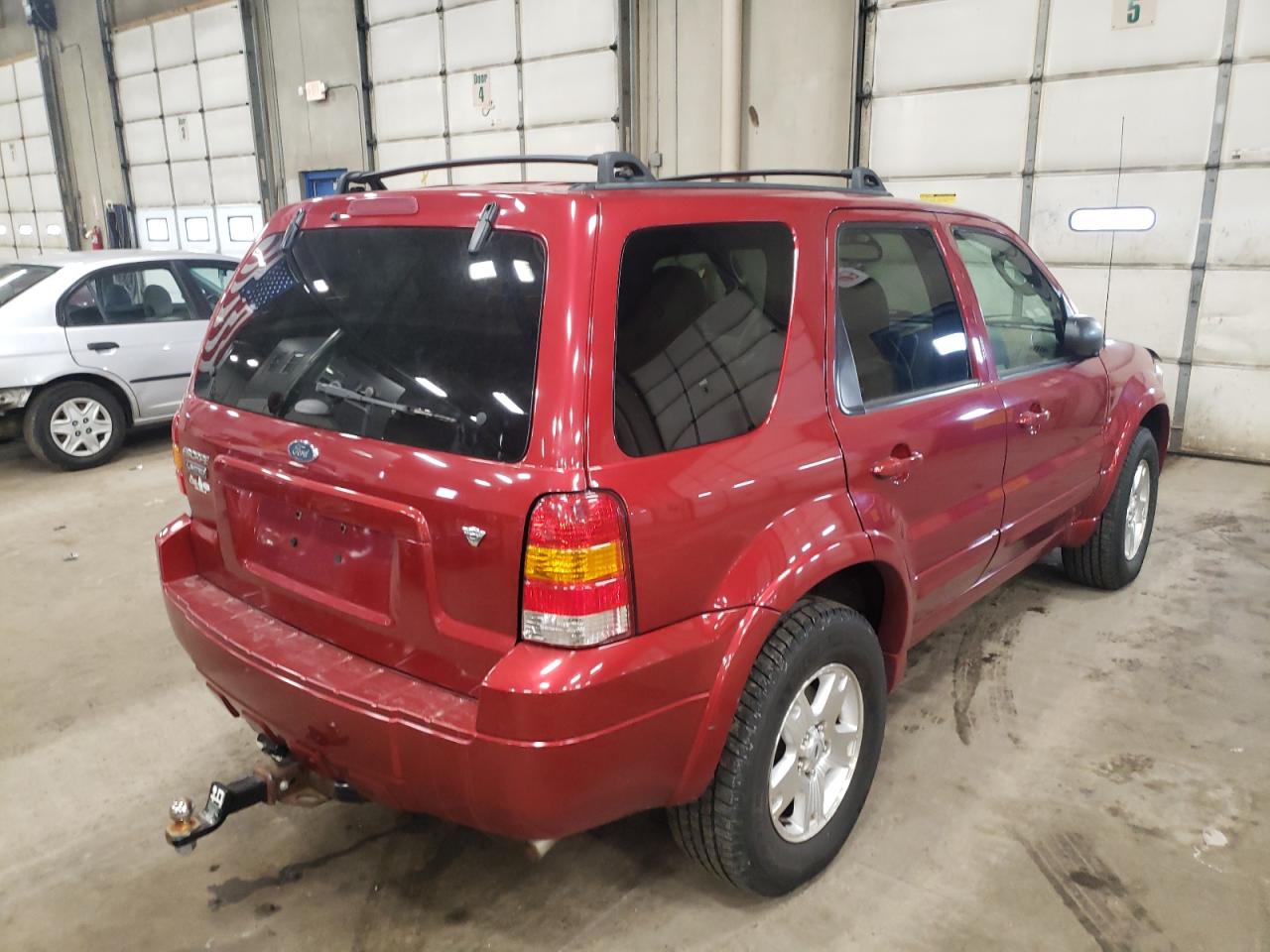 Photo 4 from auction – 2006 FORD ESCAPE LIM with VIN 1FMYU94116KA32513