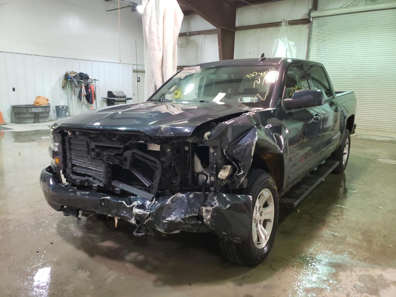 Photo 2 from auction – 2018 CHEVROLET SILVERADO with VIN 3GCUKREC1JG478749