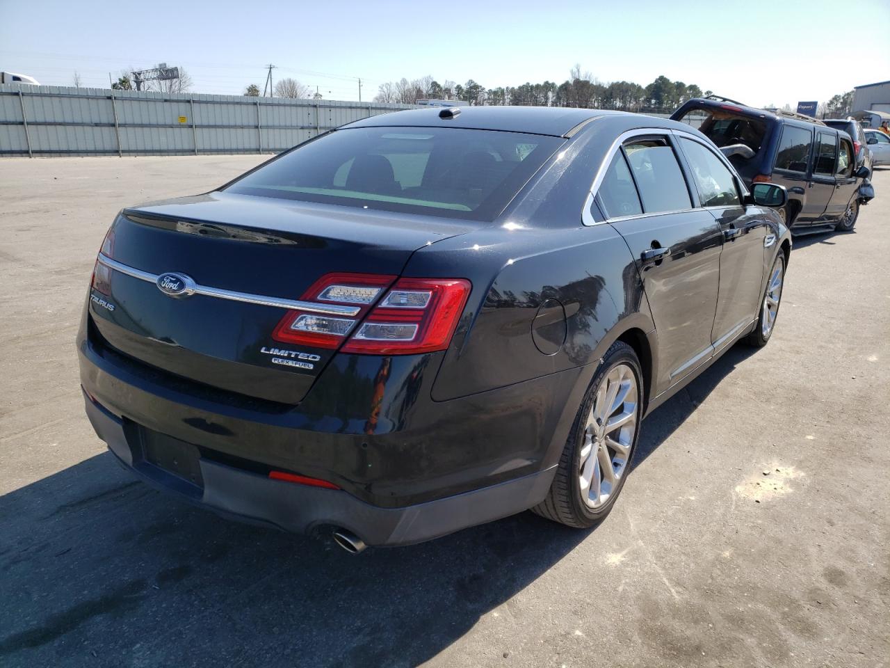 Photo 4 from auction – 2014 FORD TAURUS LIM with VIN 1FAHP2F84EG105054
