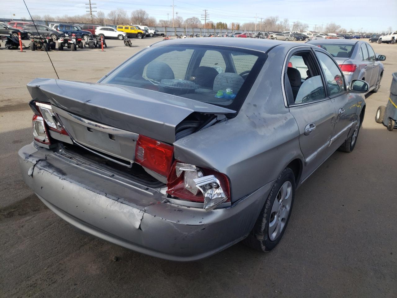 Photo 4 from auction – 2005 KIA OPTIMA LX with VIN KNAGD128955384248