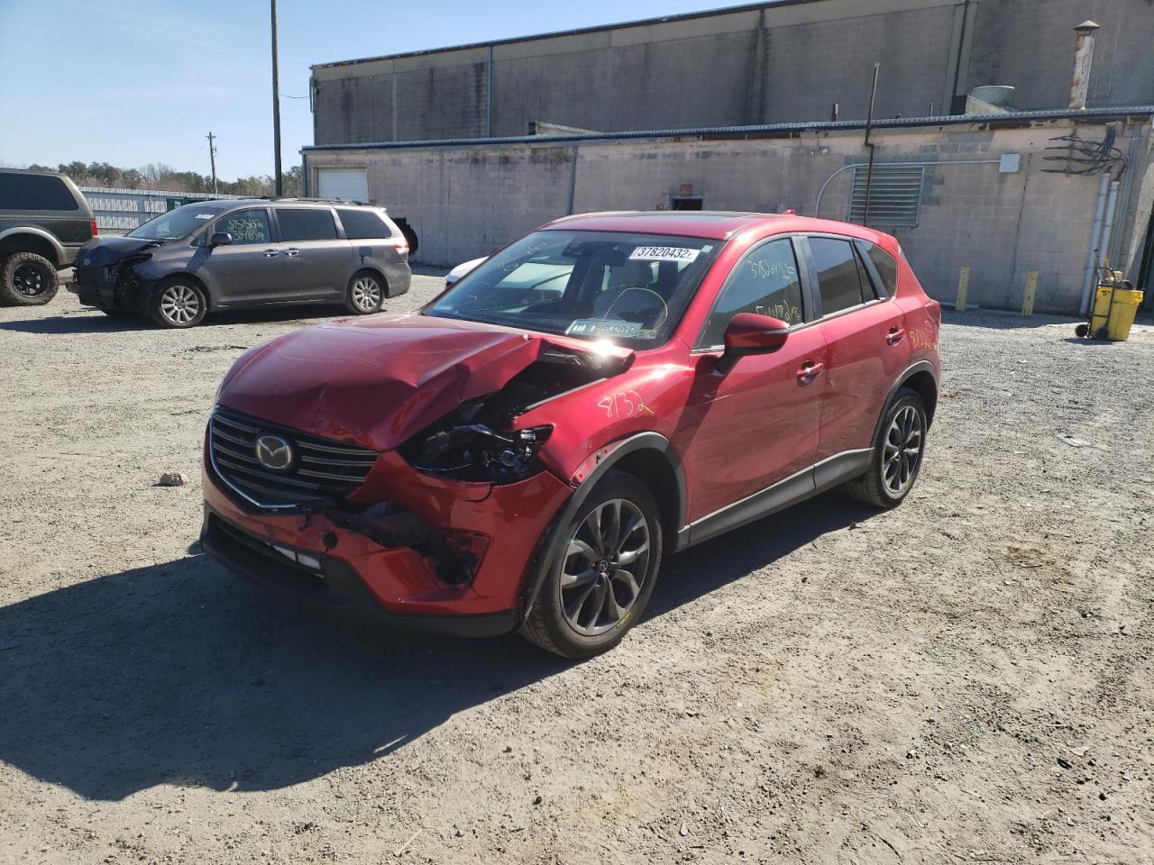 Photo 2 from auction – 2016 MAZDA CX-5 GT with VIN JM3KE4DY1G0740790