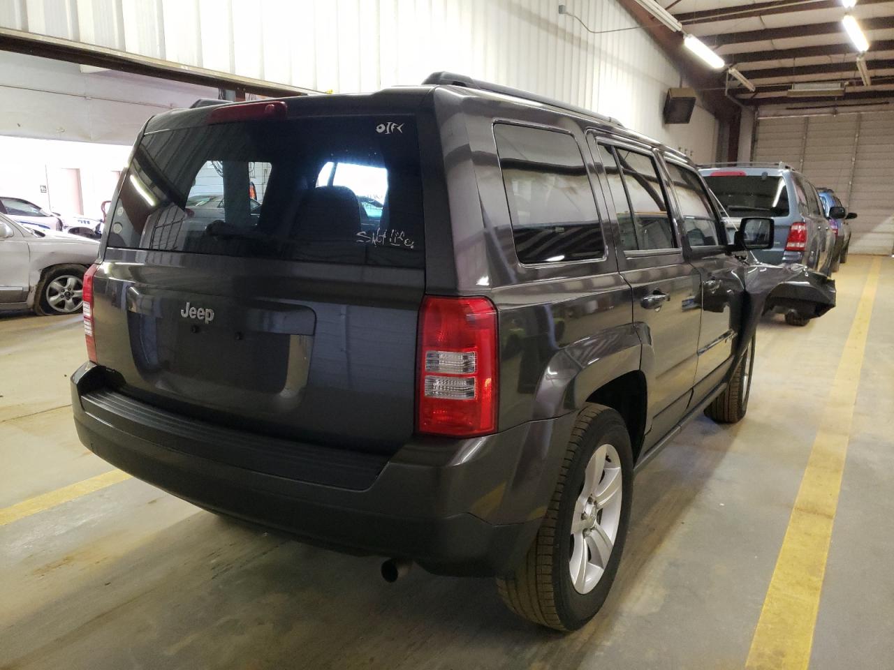 Photo 4 from auction – 2014 JEEP PATRIOT SP with VIN 1C4NJPBB3ED853132