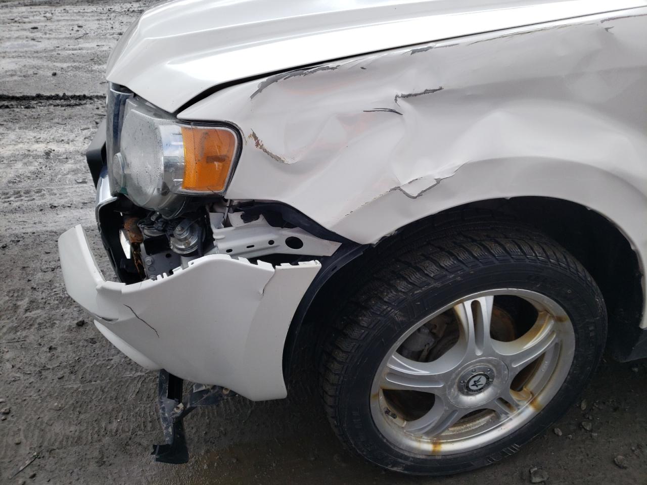 Photo 10 from auction – 2012 FORD ESCAPE LIM with VIN 1FMCU9E71CKC09621