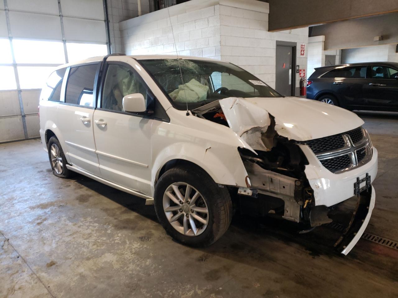 DODGE GRAND CARA 2016 with VIN 2C4RDGCG0GR369597 - Photo from auction